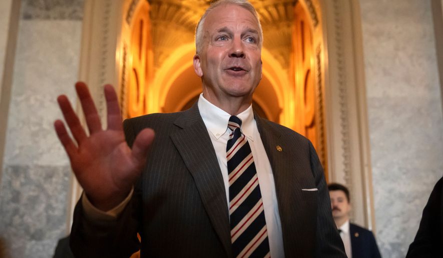 Sen. Dan Sullivan, R-Alaska, speaks to reporters at the Capitol in Washington on June 30, 2025. (AP Photo/Mark Schiefelbein) **FILE**