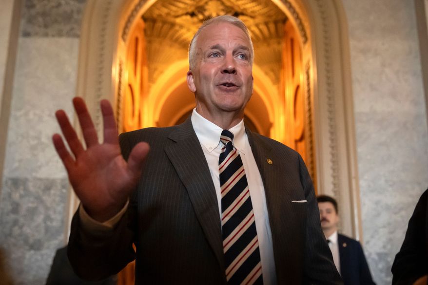 Sen. Dan Sullivan, R-Alaska, speaks to reporters at the Capitol in Washington on June 30, 2025. (AP Photo/Mark Schiefelbein) **FILE**