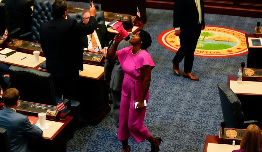 FILE - State Rep. Angie Nixon, D-Fla., speaks loudly on the House floor as the House votes on HB1D, a redistricting bill, during a special session of the Florida Legislature, April 29, 2026, in Tallahassee, Fla. (AP Photo/Mike Stewart, File)