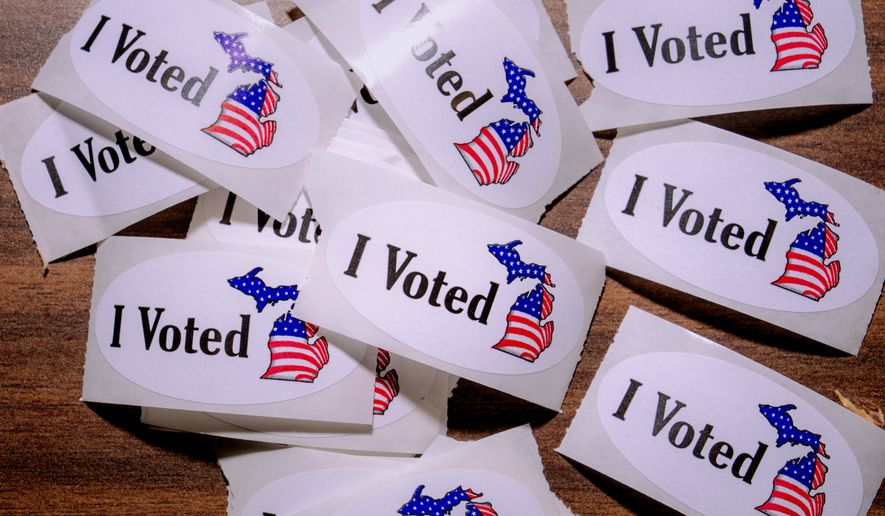 A close-up view of "I Voted" stickers at Maples Elementary School on primary election day, Tuesday, Aug. 4, 2026, in Dearborn, Mich. (AP Photo/Nic Antaya) CORRECTION: Corrects location to Dearborn NOT Detroit