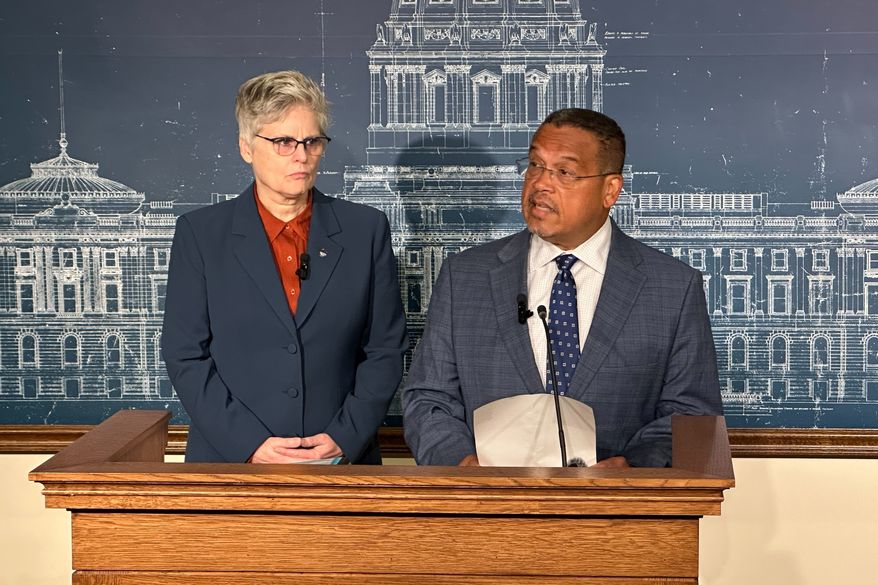 Minnesota Attorney General Keith Ellison, right, speaks during a news conference as Hennepin County Attorney Mary Moriarty looks on, Tuesday, Aug. 18, 2026, in St. Paul, Minn. (AP Photo/Mark Vancleave)