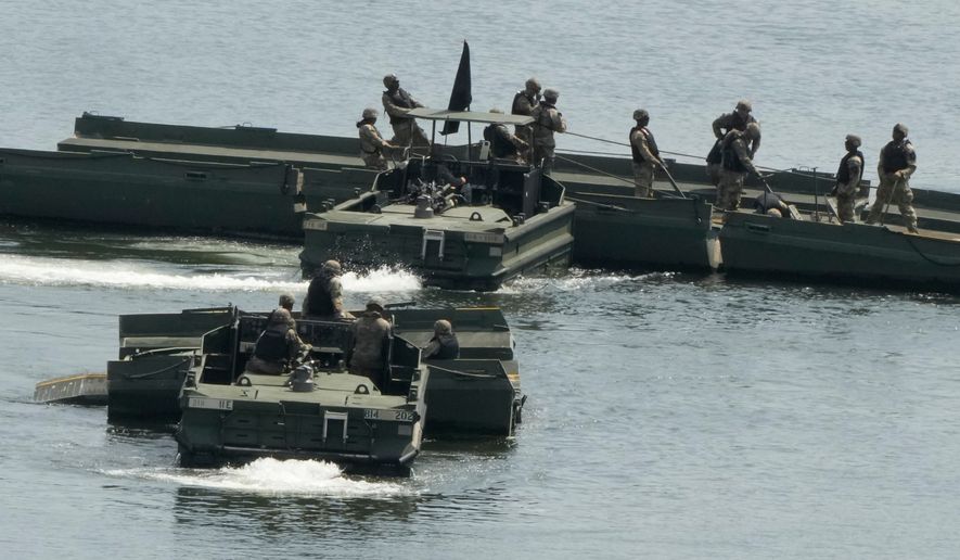 The U.S. Army's soldiers conduct a training exercise on a river in Yeoncheon, South Korea, near the border with North Korea, Tuesday, Aug. 18, 2026. (AP Photo/Ahn Young-joon)