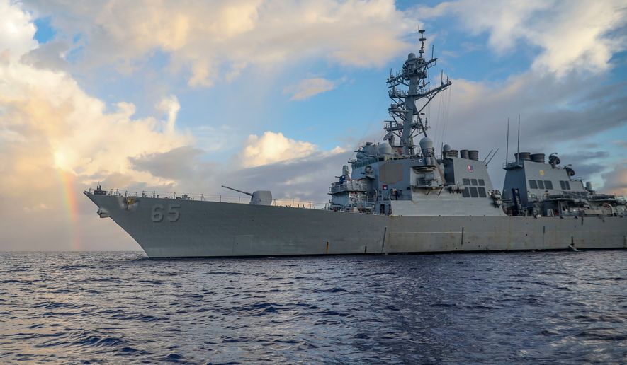 In this photo provided by U.S. Navy, Arleigh Burke-class guided-missile destroyer USS Benfold (DDG 65) conducts routine underway operations in the Philippine Sea on June 24, 2022. (Mass Communication Specialist 2nd Class Arthur Rosen/U.S. Navy via AP, File)