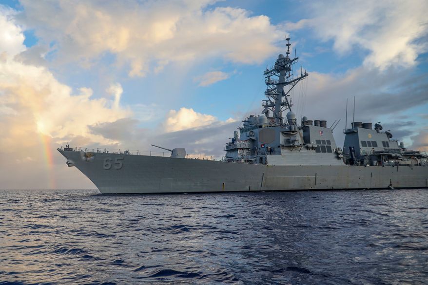 In this photo provided by U.S. Navy, Arleigh Burke-class guided-missile destroyer USS Benfold (DDG 65) conducts routine underway operations in the Philippine Sea on June 24, 2022. (Mass Communication Specialist 2nd Class Arthur Rosen/U.S. Navy via AP, File)
