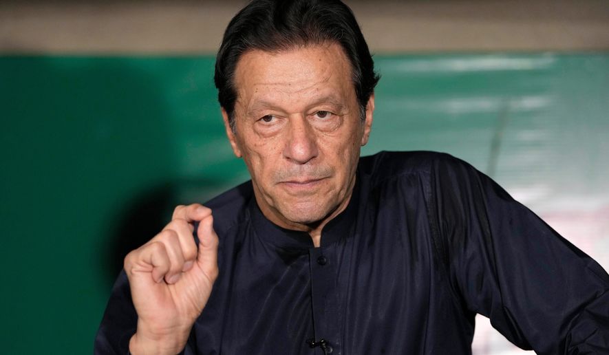 FILE - Pakistan's former Prime Minister Imran Khan gives a press conference at his home, in Lahore, Pakistan, on May 18, 2023. (AP Photo/K.M. Chaudary, File)