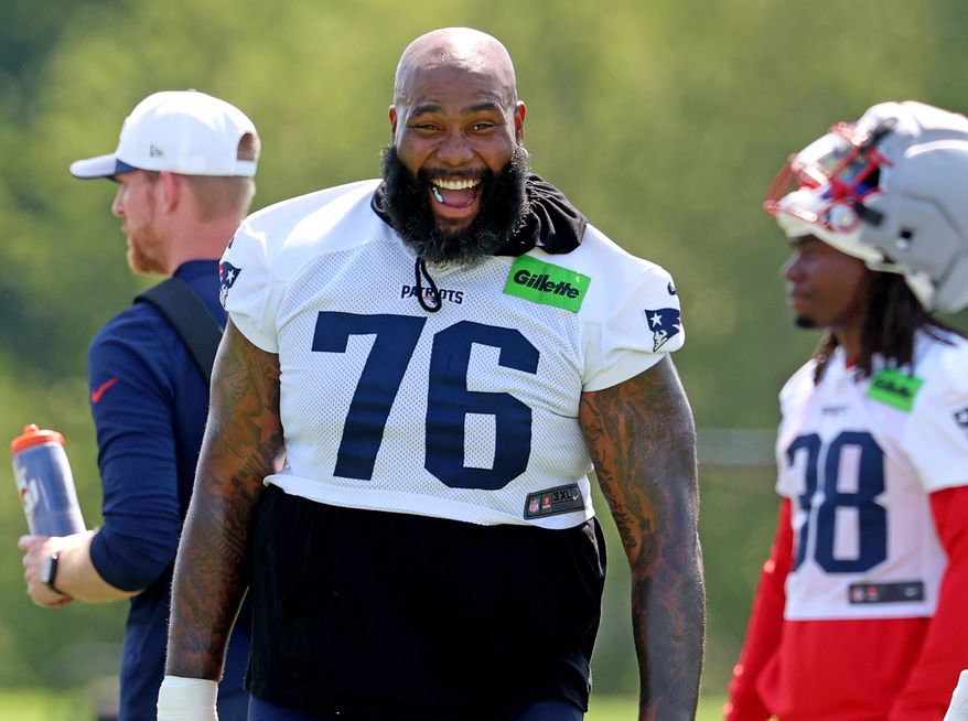 New England Patriots tackle Morgan Moses at the team's first day of NFL football training camp, Saturday, July 25, 2026, in Foxborough, Mass. (AP Photo/Mark Stockwell)