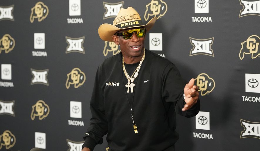 Colorado head coach Deion Sanders talks to reporters after practice at an NCAA college football training camp in Fountain, Colo., Thursday, Aug. 6, 2026. (AP Photo/David Zalubowski)