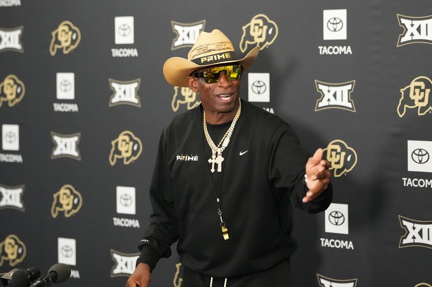 Colorado head coach Deion Sanders talks to reporters after practice at an NCAA college football training camp in Fountain, Colo., Thursday, Aug. 6, 2026. (AP Photo/David Zalubowski)