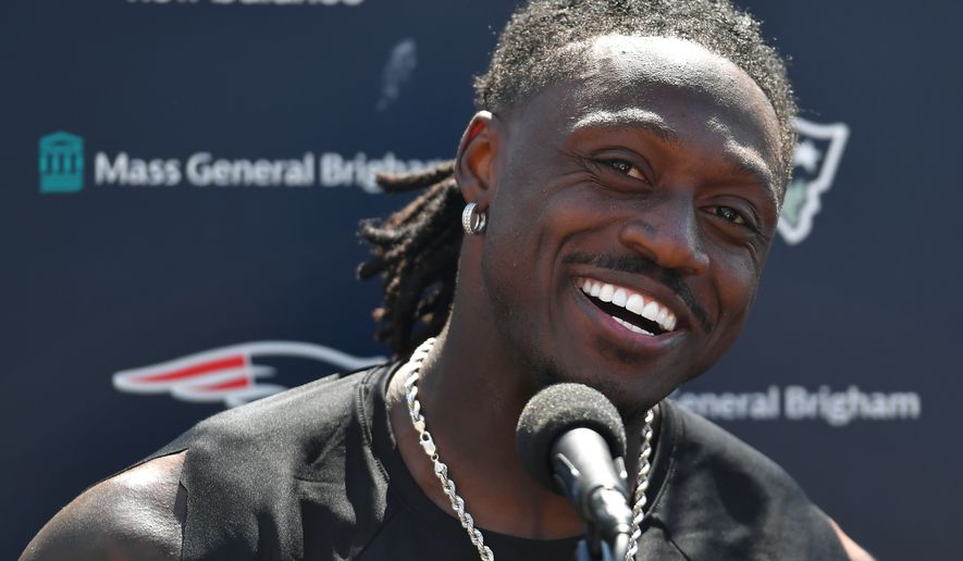New England Patriots wide receiver A.J. Brown takes questions from reporters following a joint NFL football practice with the Philadelphia Eagles, Wednesday, Aug. 19, 2026, in Foxborough, Mass. (AP Photo/Steven Senne)