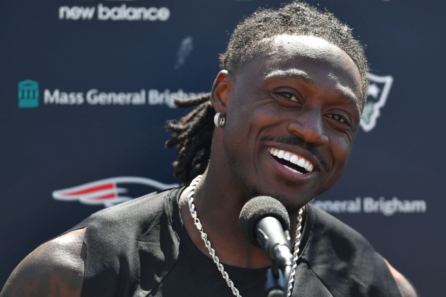New England Patriots wide receiver A.J. Brown takes questions from reporters following a joint NFL football practice with the Philadelphia Eagles, Wednesday, Aug. 19, 2026, in Foxborough, Mass. (AP Photo/Steven Senne)