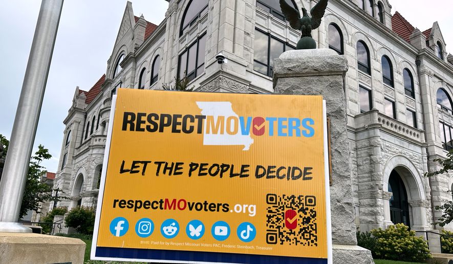 A sign in support of a proposed constitutional amendment backed by the group Respect Missouri Voters sits outside the Cole County Courthouse in Jefferson City, Mo., Tuesday, Aug. 18, 2026. (AP Photo/David A. Lieb)