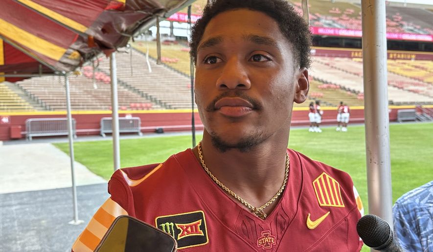 Iowa State quarterback Jaylen Raynor speaks to reporters at the team's NCAA college football media day, Wednesday, Aug. 19, 2026, in Ames, Iowa. (AP Photo/Eric Olson)
