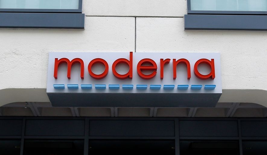 FILE - A sign marks an entrance to a Moderna building in Cambridge, Mass., May 18, 2020. (AP Photo/Bill Sikes, File)prnto
