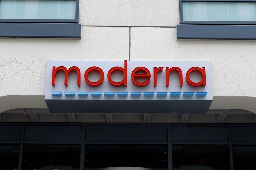 FILE - A sign marks an entrance to a Moderna building in Cambridge, Mass., May 18, 2020. (AP Photo/Bill Sikes, File)prnto