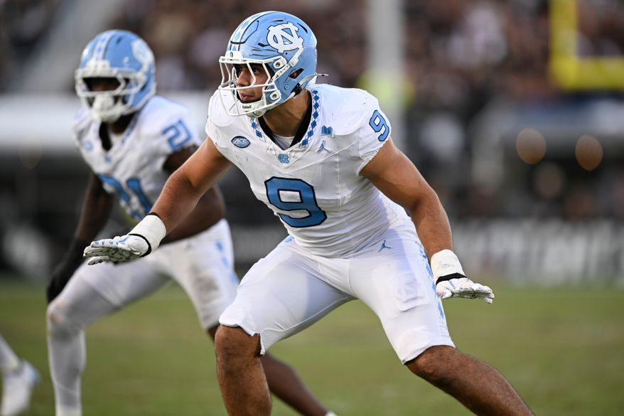 FILE - North Carolina defensive lineman Melkart Abou-Jaoude (9) follows a play against Central Florida during the second half of an NCAA football game, Sept. 20, 2025, in Orlando, Fla. (AP Photo/Phelan M. Ebenhack, File)