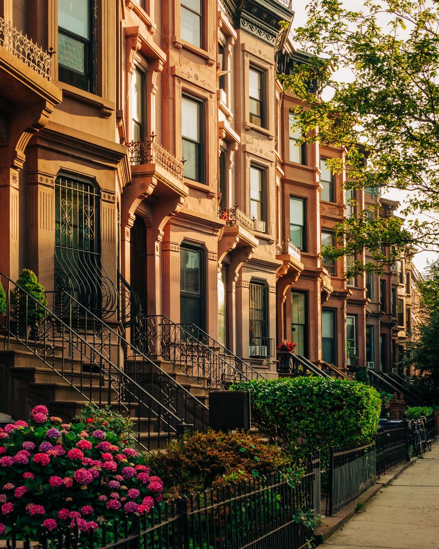 Brownstones in the Bedford-Stuyvesant neighborhood of Brooklyn, New York City. File photo credit: Jon Bilous via Shutterstock.
