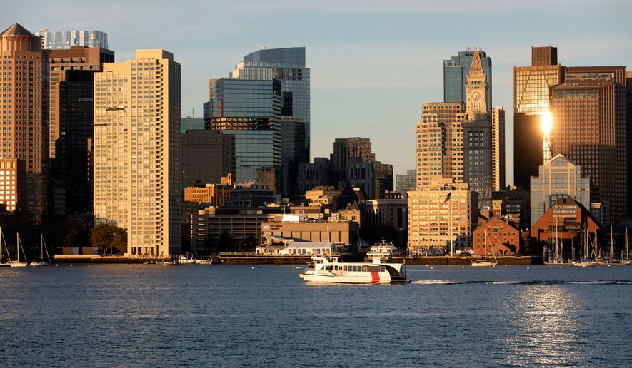 FILE - The Boston harbor and the city skyline are photographed, Oct. 28, 2022, in Boston. (AP Photo/Michael Dwyer, File)