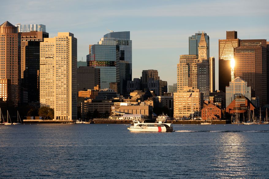 FILE - The Boston harbor and the city skyline are photographed, Oct. 28, 2022, in Boston. (AP Photo/Michael Dwyer, File)
