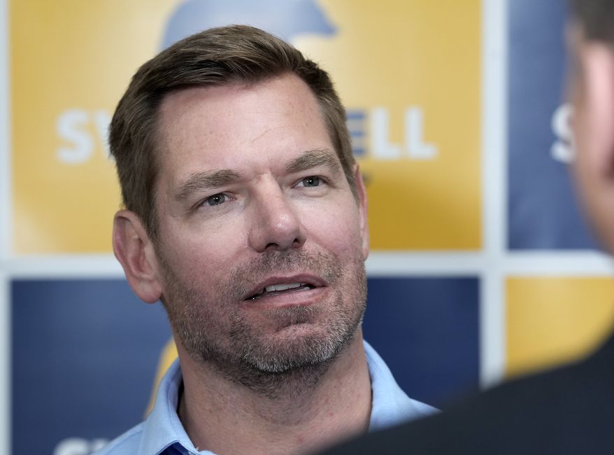 Then-Rep. Eric Swalwell, D-Calif., talks with reporters after holding a town hall meeting in Sacramento, Calif., on April 7, 2026. (AP Photo/Rich Pedroncelli) **FILE**