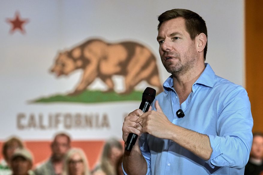 Rep. Eric Swalwell, D-Calif., appears at a town hall meeting in Sacramento, Calif., April 7, 2026. (AP Photo/Rich Pedroncelli, File)