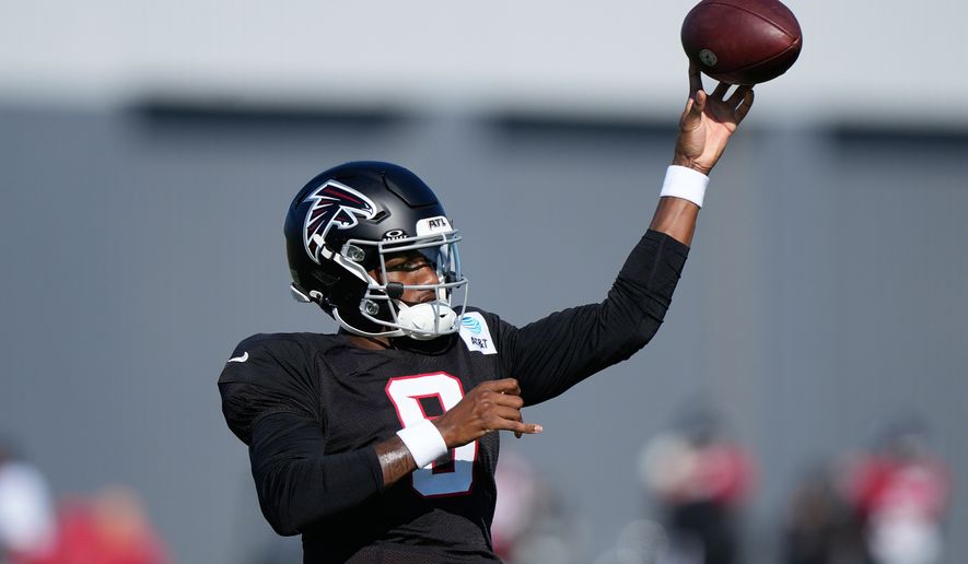 Atlanta Falcons quarterback Michael Penix Jr. (9) runs drills during an NFL football training camp practice on Monday, Aug. 17, 2026, in Flowery Branch, Ga. (AP Photo/Brynn Anderson)