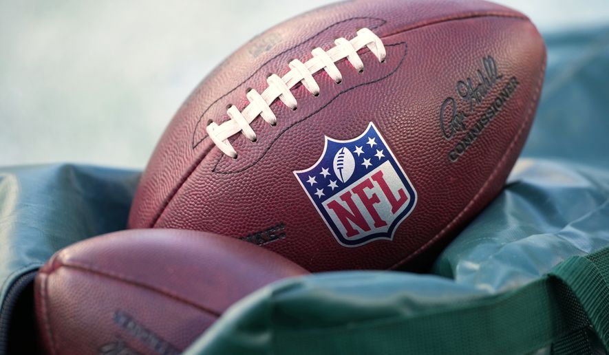 Footballs are seen before an NFL football game in Philadelphia on Jan. 4, 2026. (AP Photo/Matt Slocum, File)