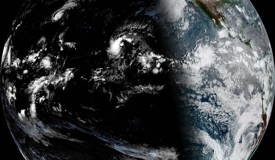 This satellite image provided by NOAA shows Hurricane Lala on Thursday, Aug. 20, 2026, in the Pacific Ocean northeast of Hawaii. (NOAA via AP)