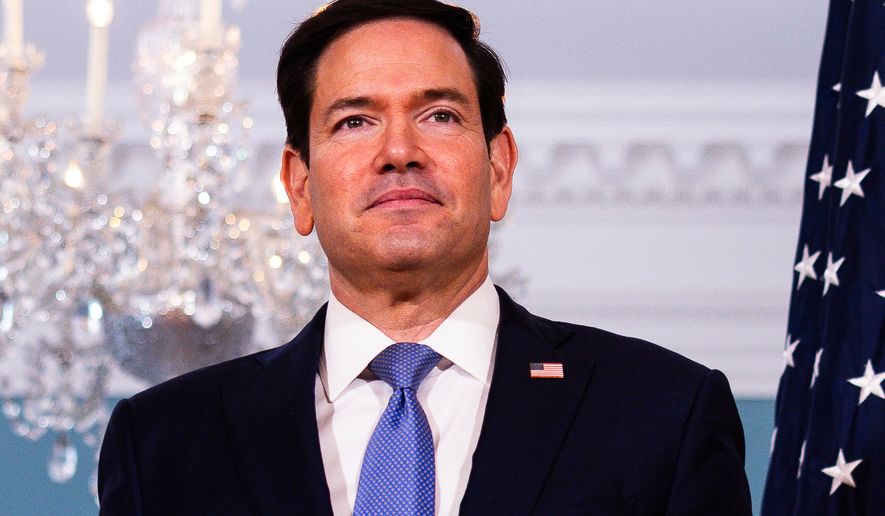 Secretary of State Marco Rubio arrives with Austrian Foreign Minister Beate Meinl-Reisinger, not shown, to the Treaty Room at the State Department, Tuesday, Aug. 11, 2026, in Washington. (AP Photo/Tierney L. Cross)