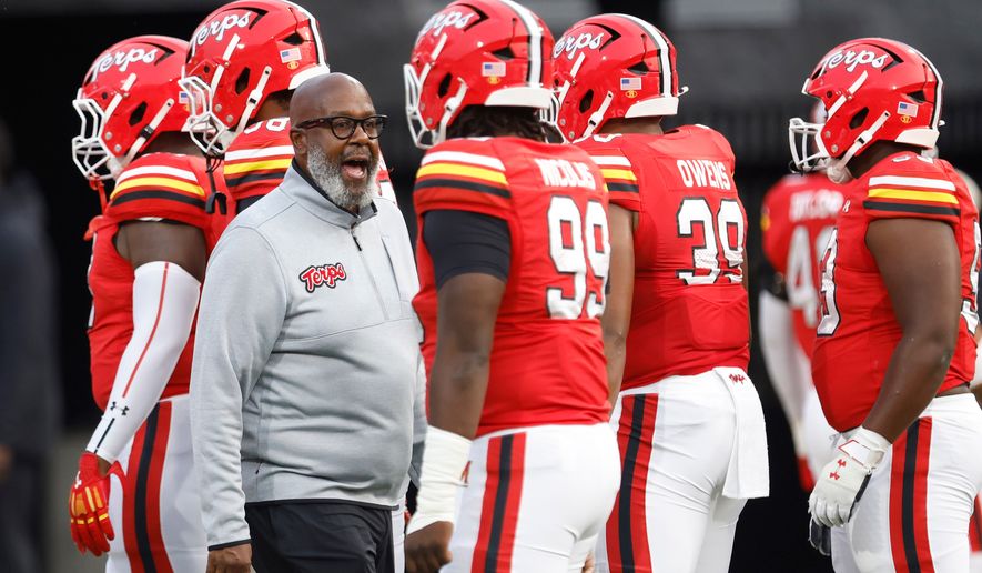 FILE - Maryland head coach Mike Locksley encourages his players before an NCAA football game against Northern Illinois, Sept. 5, 2025, in College Park, Md. (AP Photo/Mike Buscher, File)