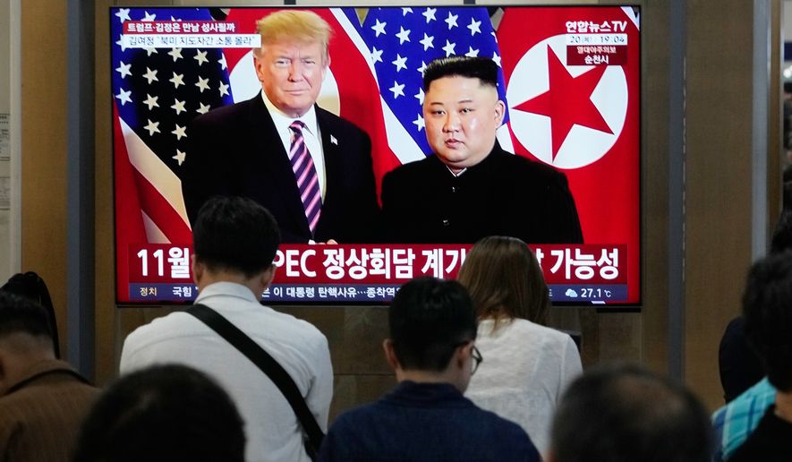 A TV screen shows a file image of North Korean leader Kim Jong Un and U.S. President Donald Trump during a news program at Seoul Railway Station in Seoul, South Korea, Thursday, Aug. 20, 2026. (AP Photo/Ahn Young-joon)