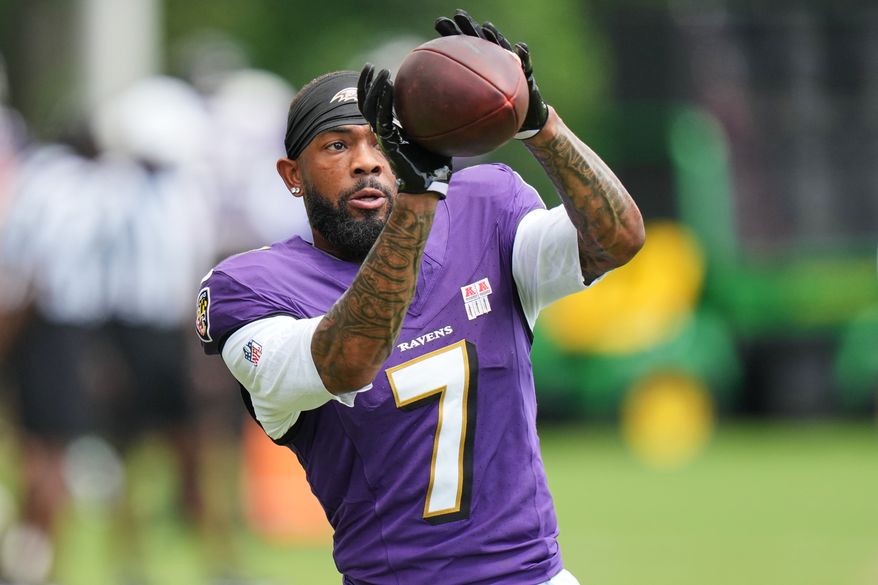 FILE - Baltimore Ravens wide receiver Rashod Bateman (7) works out during the team's NFL football training camp, Monday, Aug. 17, 2026, at the Under Armour Performance Center in Owings Mills, Md. (AP Photo/Stephanie Scarbrough,File)