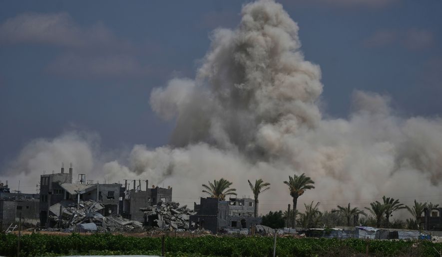The Israeli army demolishes buildings east of Deir al-Balah, central Gaza Strip, Saturday Aug. 22, 2026. (AP Photo/Abdel Kareem Hana)