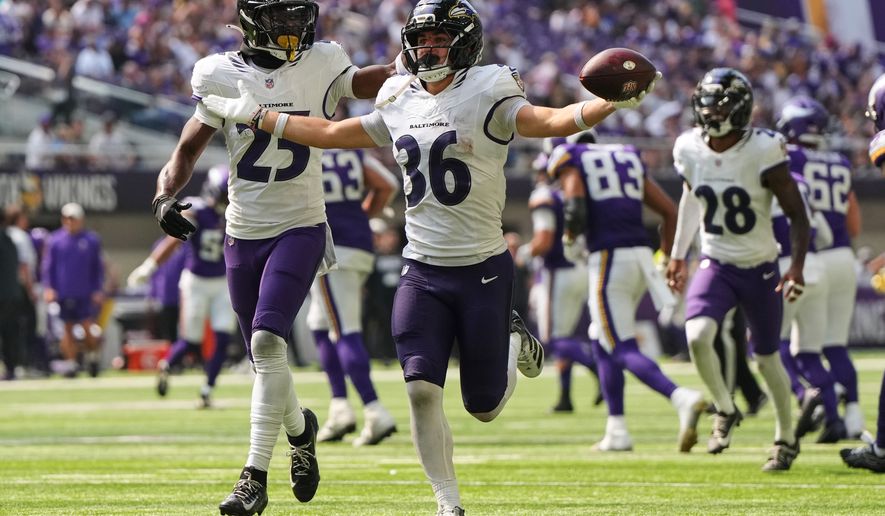 Baltimore Ravens safety Silas Walters (36) celebrates after intercepting a pass against the Minnesota Vikings during the second half of an NFL preseason football game, Saturday, Aug. 22, 2026, in Minneapolis. (AP Photo/Abbie Parr)