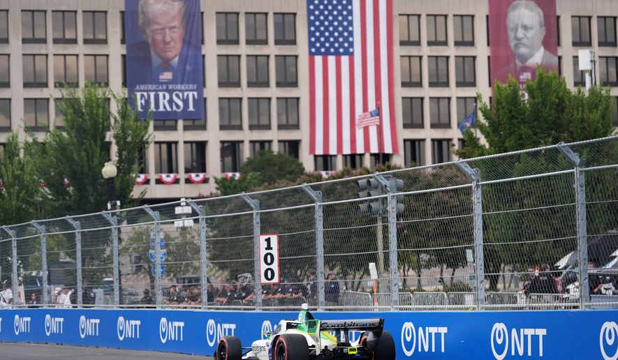 Race car diver Caio Collet drives during a qualifying race prior to Sunday's Freedom 250 Grand Prix auto race in Washington, Saturday, Aug. 22, 2026.(AP Photo/Alex Brandon)