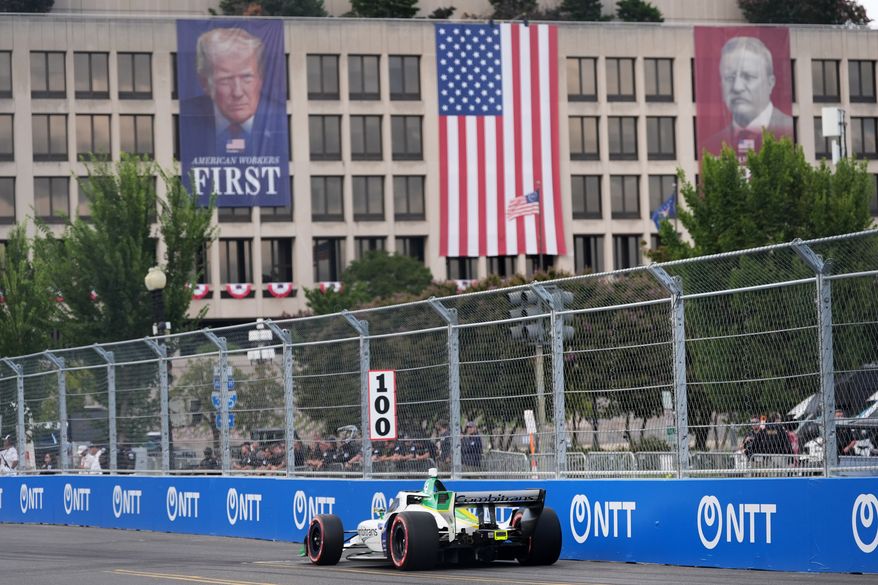 Race car diver Caio Collet drives during a qualifying race prior to Sunday's Freedom 250 Grand Prix auto race in Washington, Saturday, Aug. 22, 2026.(AP Photo/Alex Brandon)