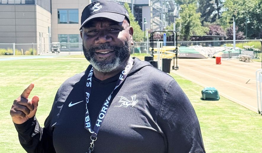 Sacramento State football coach Alonzo Carter poses for a photo on campus on Friday, July 31, 2026 in Sacramento, Calif. (AP Photo/Josh Dubow)
