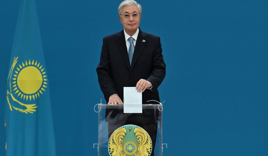 In this photo released by Kazakhstan's President Press Office, Kazakhstan's President Kassym-Jomart Tokayev casts his ballot at a polling station in Astana, Kazakhstan, Sunday, Aug. 23, 2026.(Kazakhstan's President Press Office via AP)