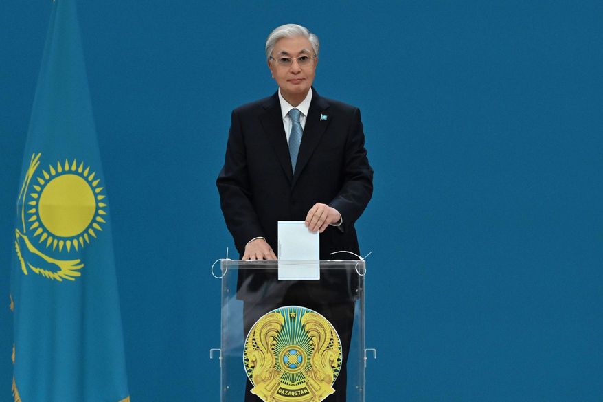 In this photo released by Kazakhstan's President Press Office, Kazakhstan's President Kassym-Jomart Tokayev casts his ballot at a polling station in Astana, Kazakhstan, Sunday, Aug. 23, 2026.(Kazakhstan's President Press Office via AP)