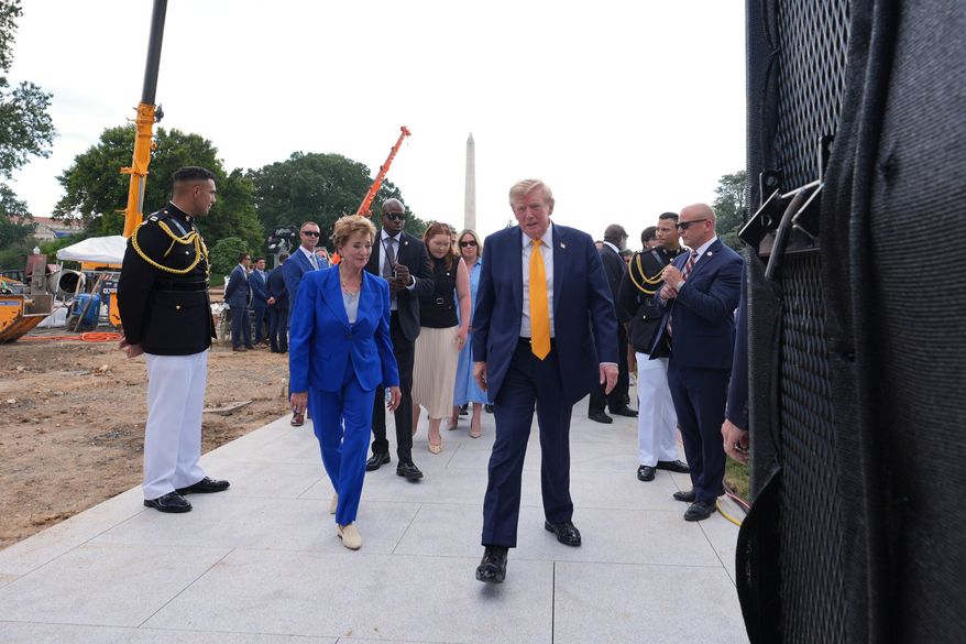 President Donald Trump, center right, walks with Education Secretary Linda McMahon, center left, and guests after a back to school event in the Rose Garden of the White House, Monday, Aug. 24, 2026, in Washington. (AP Photo/Alex Brandon)