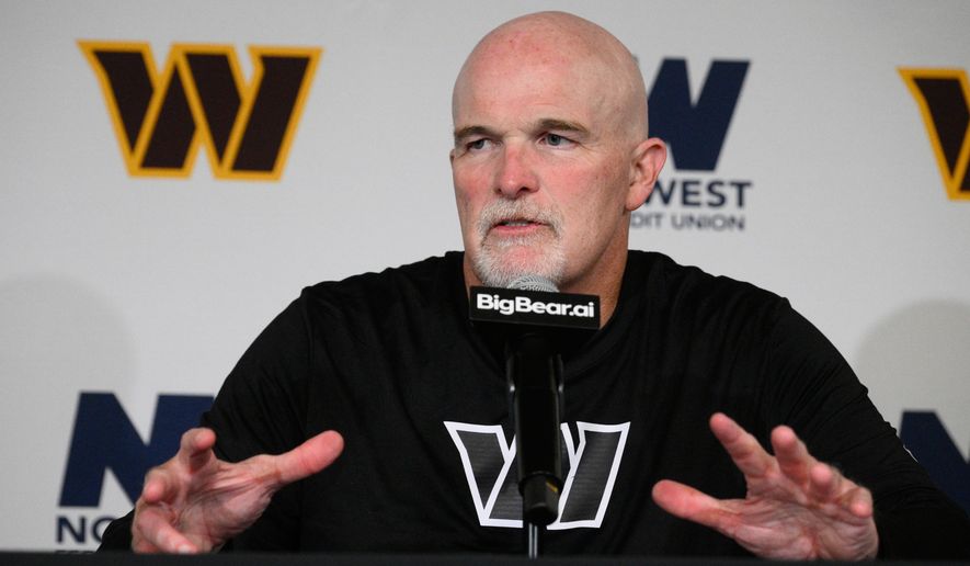 Washington Commanders head coach Dan Quinn speaks during a post game news conference after an NFL preseason football game against the Miami Dolphins, Friday, Aug. 14, 2026, in Landover, MD. (AP Photo/Nick Wass)