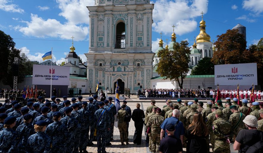 Ukrainian and foreign officials attend a ceremony marking Ukraine's Independence Day in Kyiv, Ukraine, Monday, Aug. 24, 2026. (AP Photo/Efrem Lukatsky)