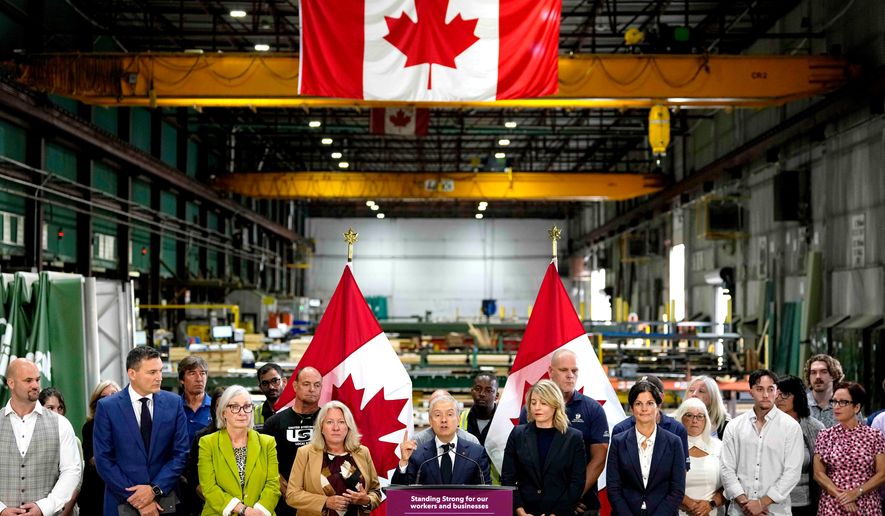 Minister of Finance and National Revenue Francois-Philippe Champagne speaks at a news conference on Canada's response to U.S. tariffs, at a roofing company in Ottawa, on Tuesday, Aug. 25, 2026. (Justin Tang/The Canadian Press via AP)