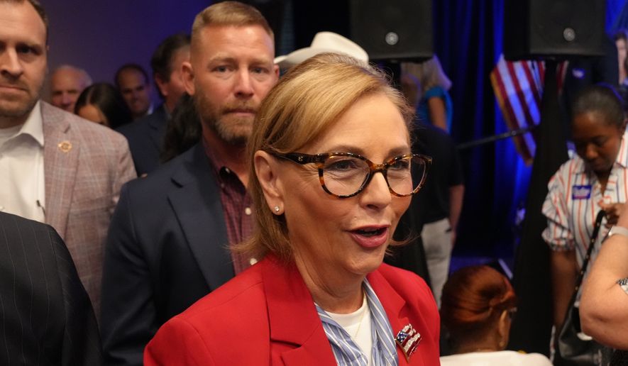 Sen. Darline Graham, R-S.C., heads out into the crowd after winning a special Republican primary runoff to replace her brother, the Sen. Lindsey Graham, R-S.C., in the November general election, Tuesday, Aug. 25, 2026, in Columbia, S.C. (AP Photo/Meg Kinnard) ** FILE **