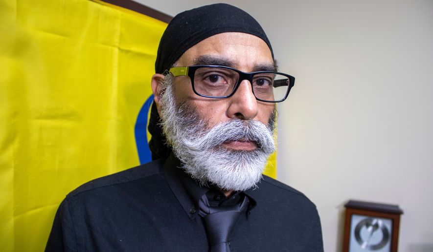 FILE - Sikh separatist leader Gurpatwant Singh Pannun stands in his office in New York on Nov. 29, 2023. (AP Photo/Ted Shaffrey, File)
