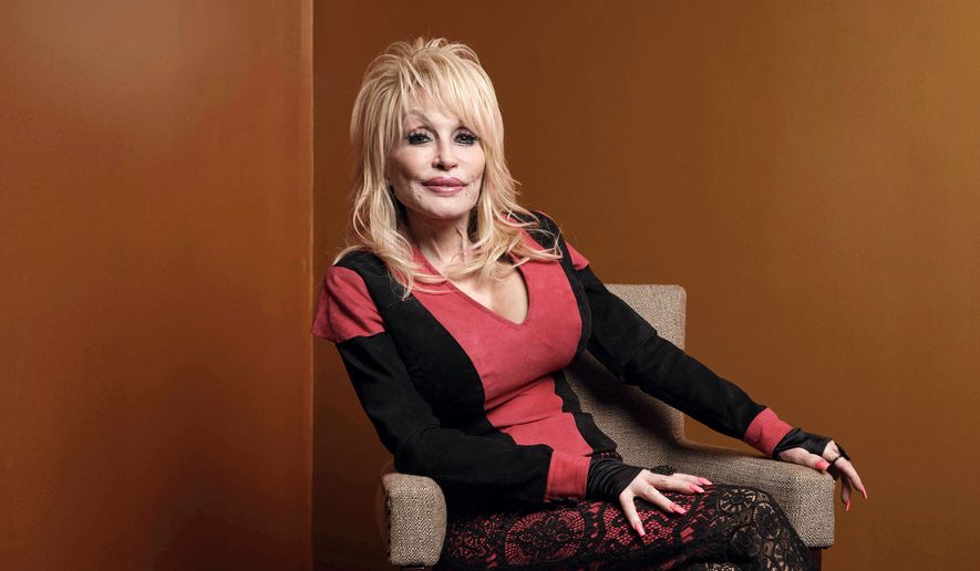 Dolly Parton poses at the Carnegie Medal of Philanthropy Ceremony in New York on Oct. 13, 2022. (AP Photo/Andres Kudacki) **FILE**