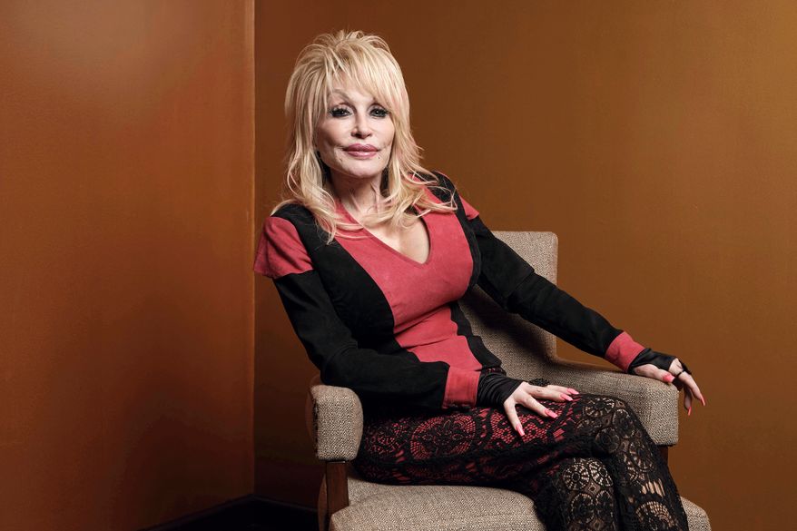 Dolly Parton poses at the Carnegie Medal of Philanthropy Ceremony in New York on Oct. 13, 2022. (AP Photo/Andres Kudacki) **FILE**