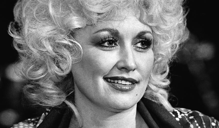 Country singer Dolly Parton appears at a rehearsal session in Nashville, Wednesday, Nov. 11, 1982. (AP Photo/Mark Humphrey, File)