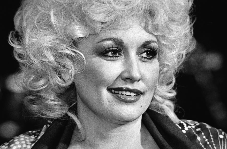 Country singer Dolly Parton appears at a rehearsal session in Nashville, Wednesday, Nov. 11, 1982. (AP Photo/Mark Humphrey, File)