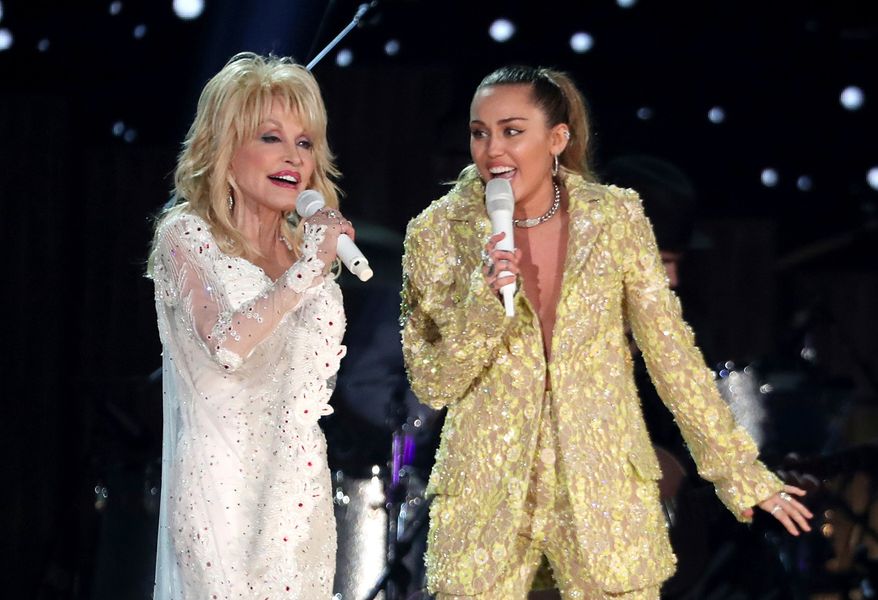 Dolly Parton, left, and Miley Cyrus perform "Jolene" at the 61st annual Grammy Awards in Los Angeles on Feb. 10, 2019. (Photo by Matt Sayles/Invision/AP, File)