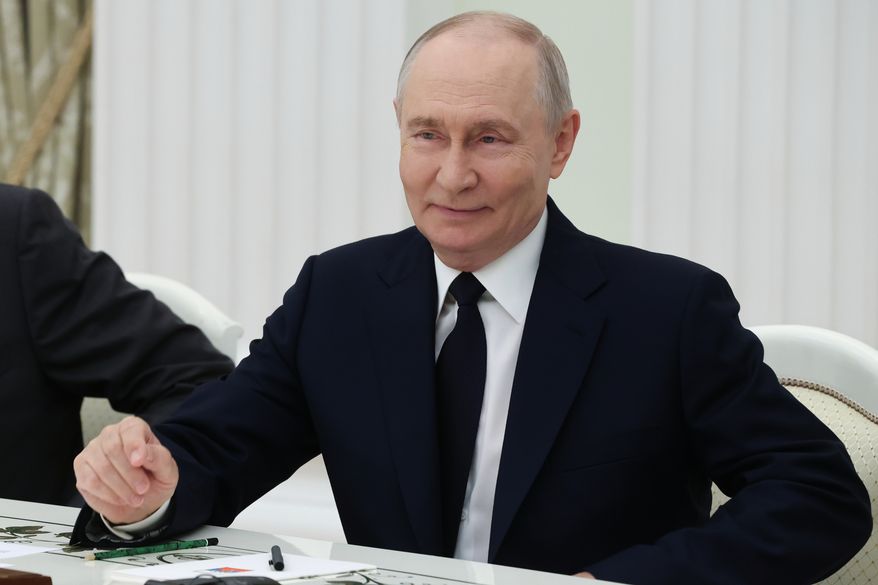Russian President Vladimir Putin speaks to Indian Foreign Minister Subrahmanyam Jaishankar during their meeting at the Senate Palace of the Kremlin in Moscow, Monday, Aug. 24, 2026. (Sergei Karpukhin/Sputnik, Kremlin Pool Photo via AP)